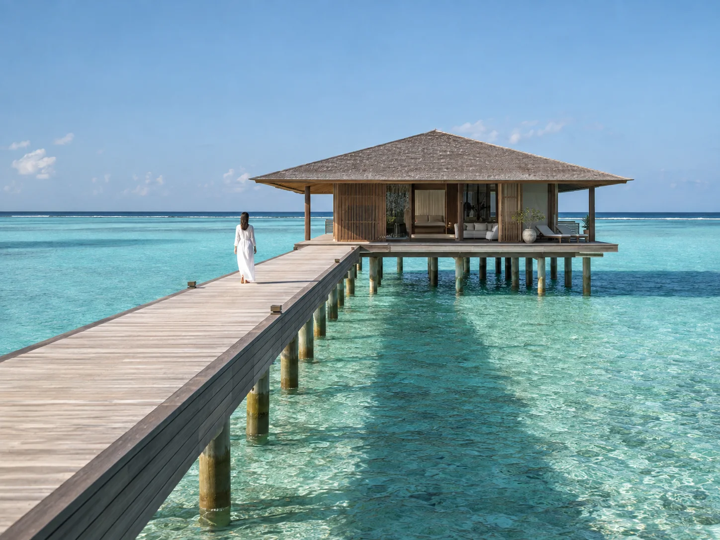 Concept study of a water villa on timber piles over a lagoon with a long jetty.